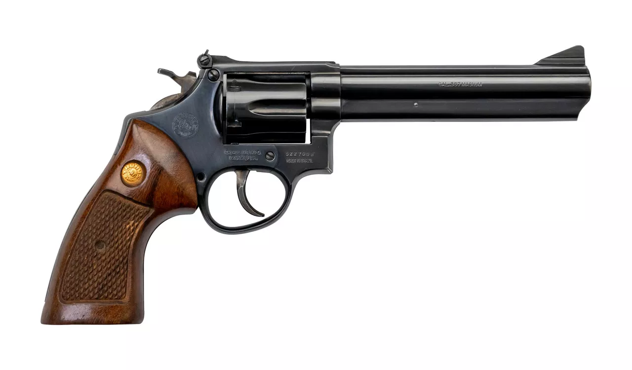Taurus 669 Used .357 Mag, 6″ Barrel, Wood Grips, Blued, 6rd